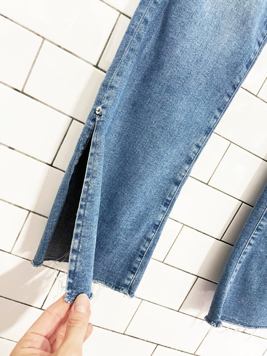 pilcro high rise skinny bootcut slit hem jeans | anthropologie - good market thrift store