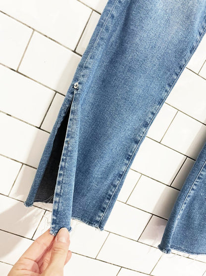 pilcro high rise skinny bootcut slit hem jeans | anthropologie - good market thrift store