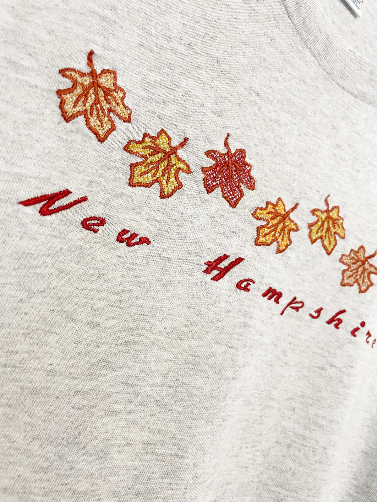 vintage new hampshire autumn leaves embroidered tee | delta