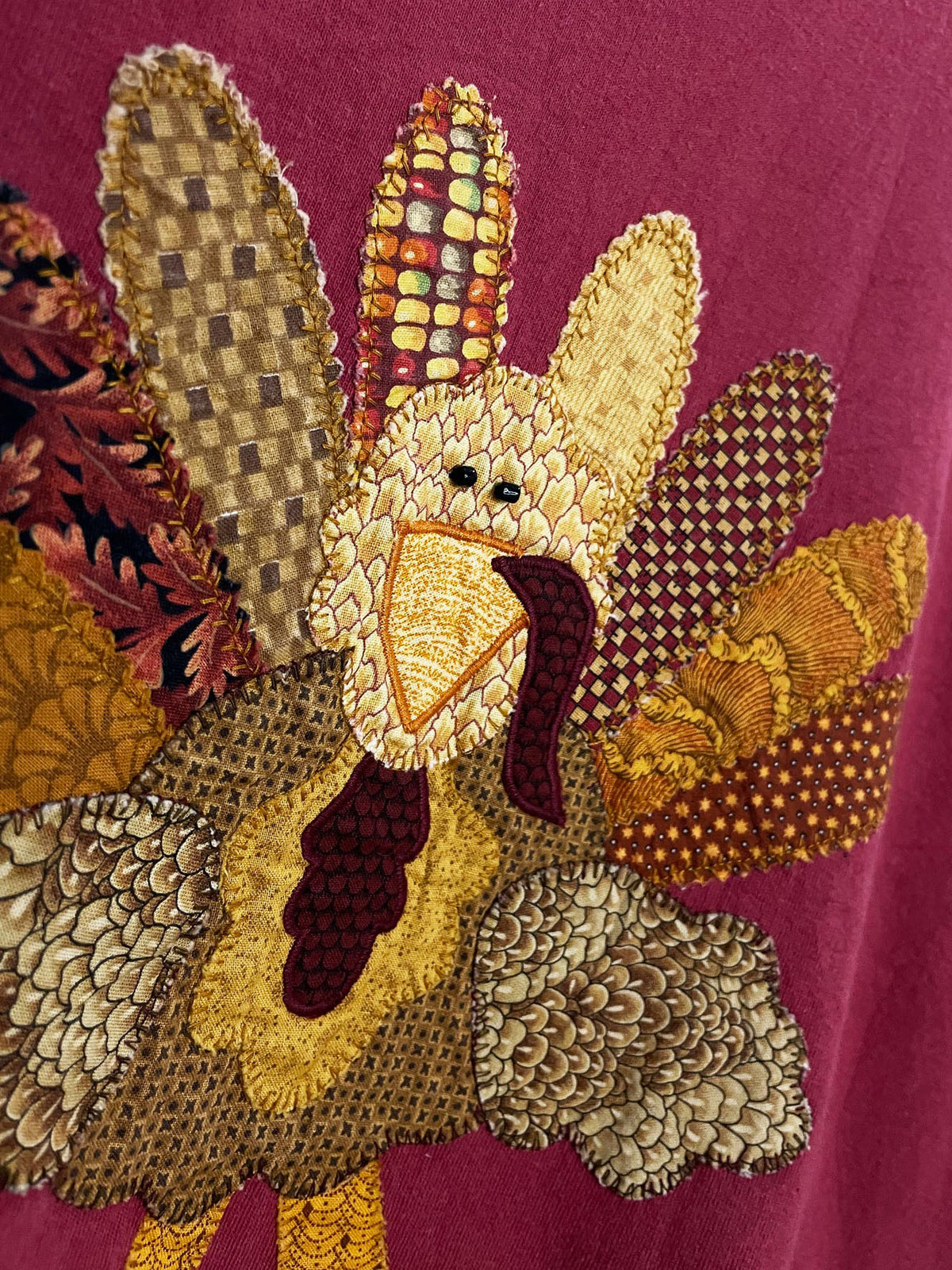 vintage patchwork turkey blanket stitch tee | gildan