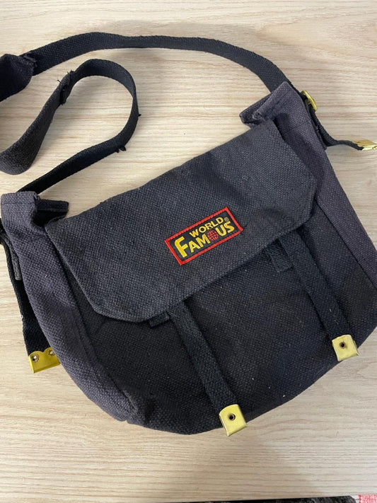 world famous faded messenger bag - good market thrift store