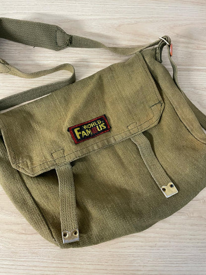 world famous faded messenger bag