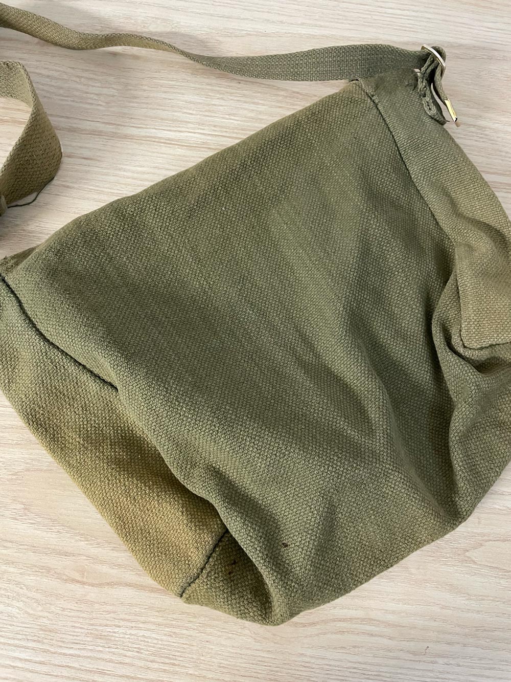 world famous faded messenger bag