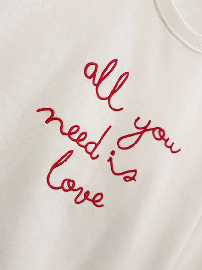 all you need is love embroidered sweatshirt - good market thrift store