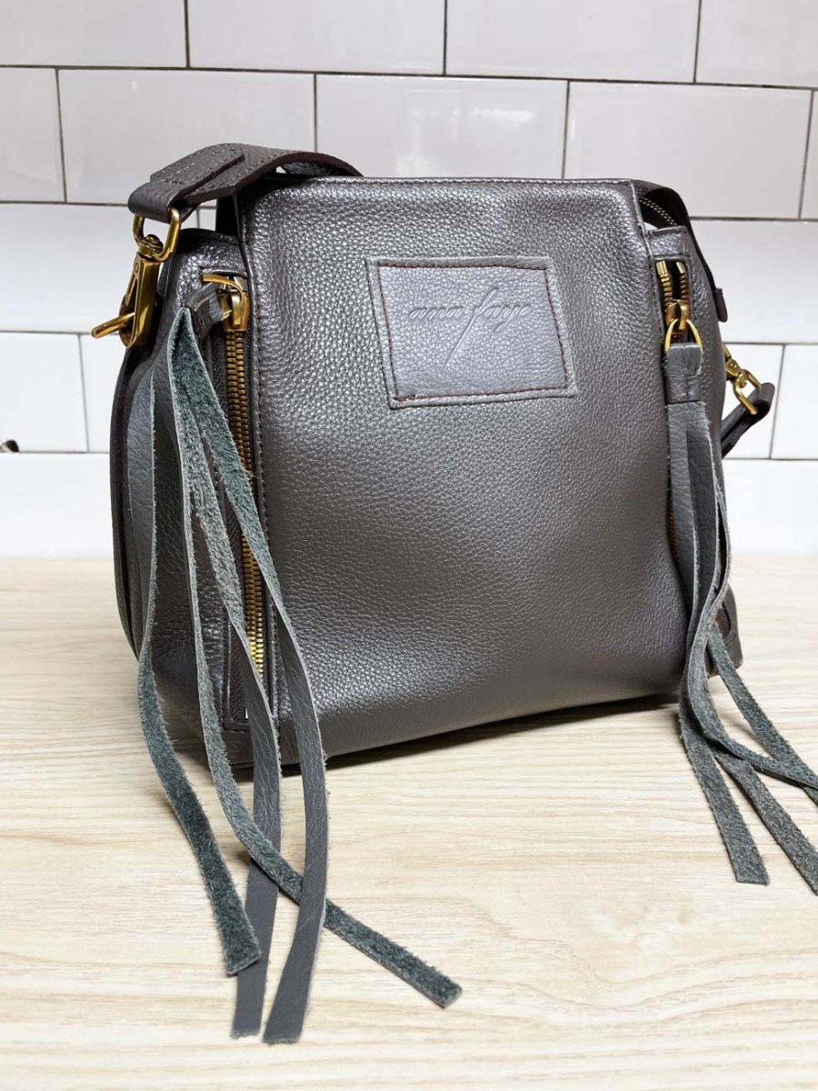 ana faye soft leather tassel convertible bag - good market thrift store