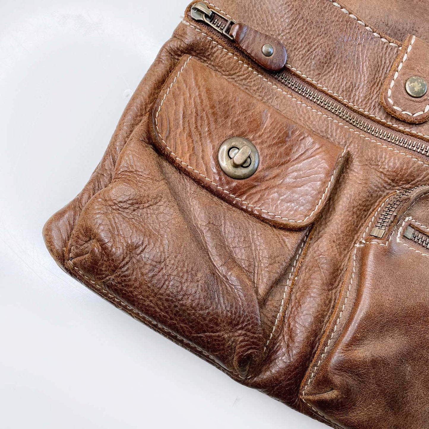 roots ventian village tribe leather bag