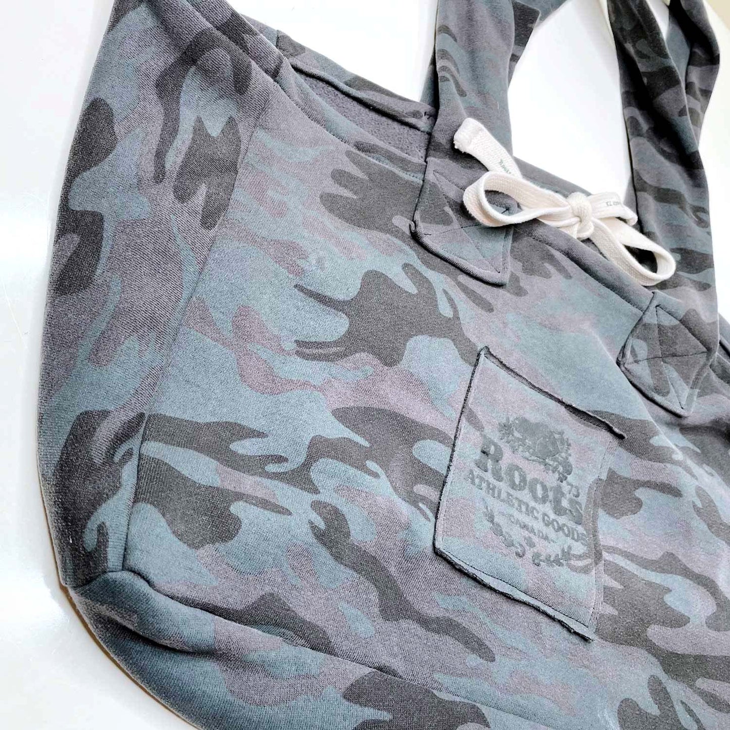 roots upcycled camo logo tote bag