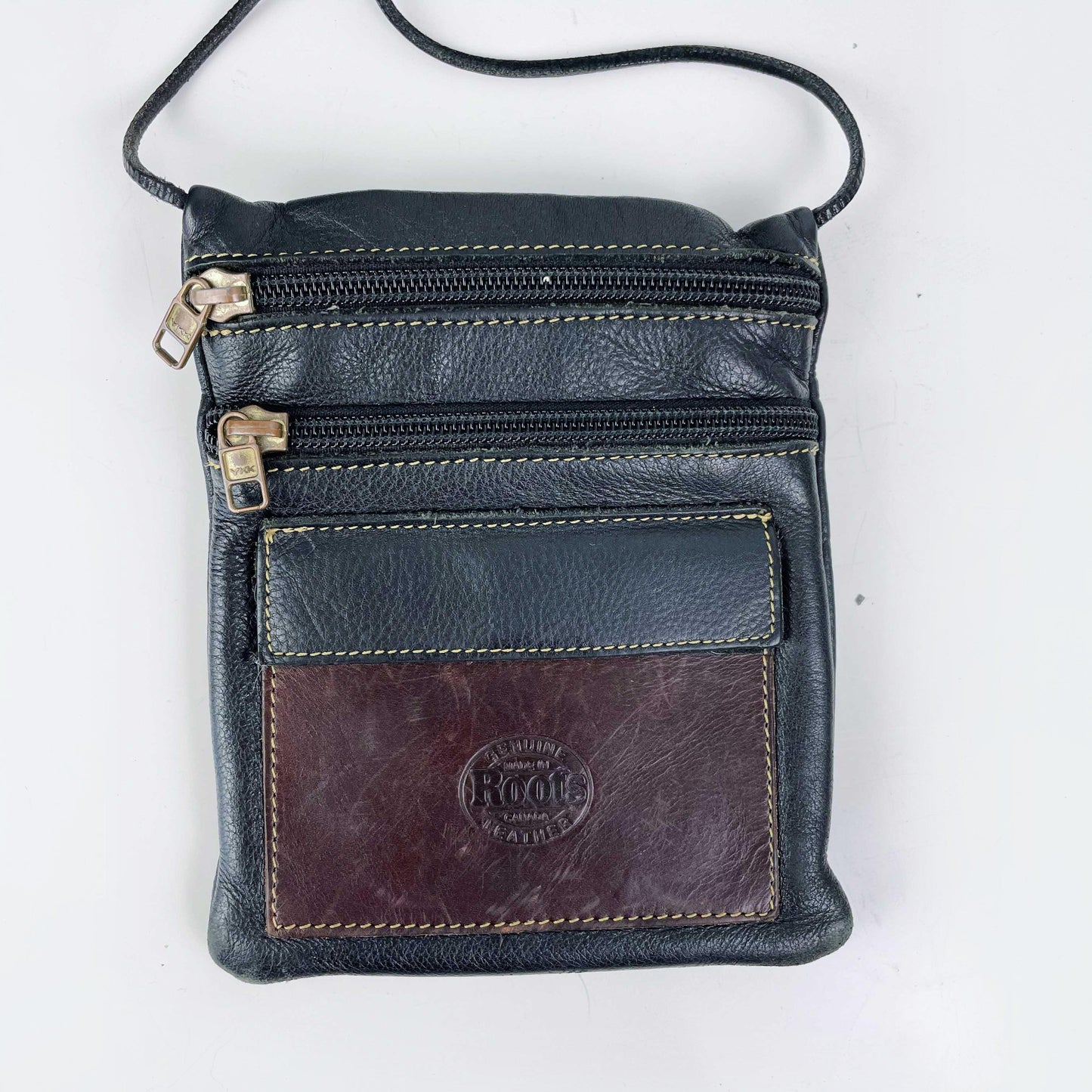 vintage roots two tone leather crossbody