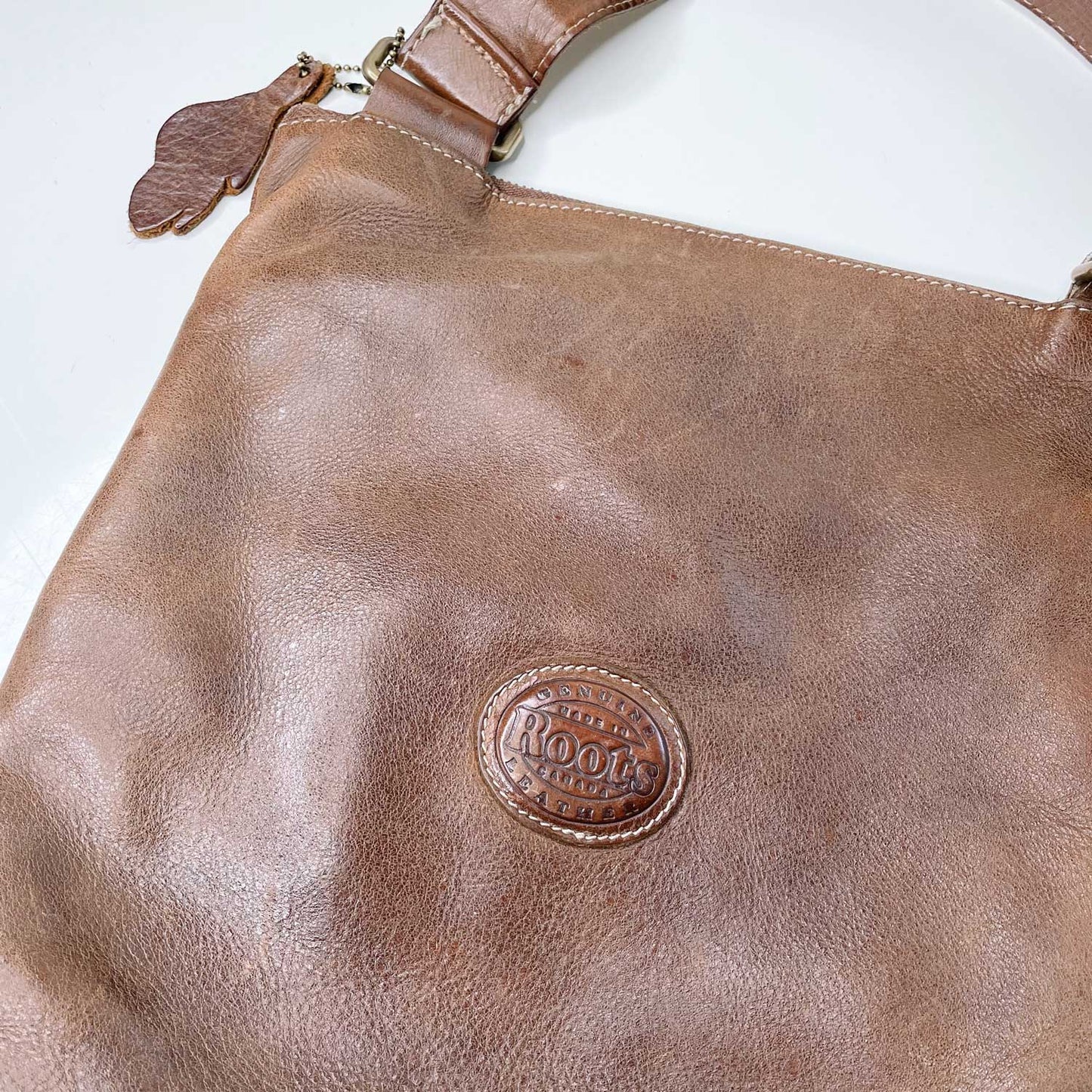 roots ventian village tribe leather bag