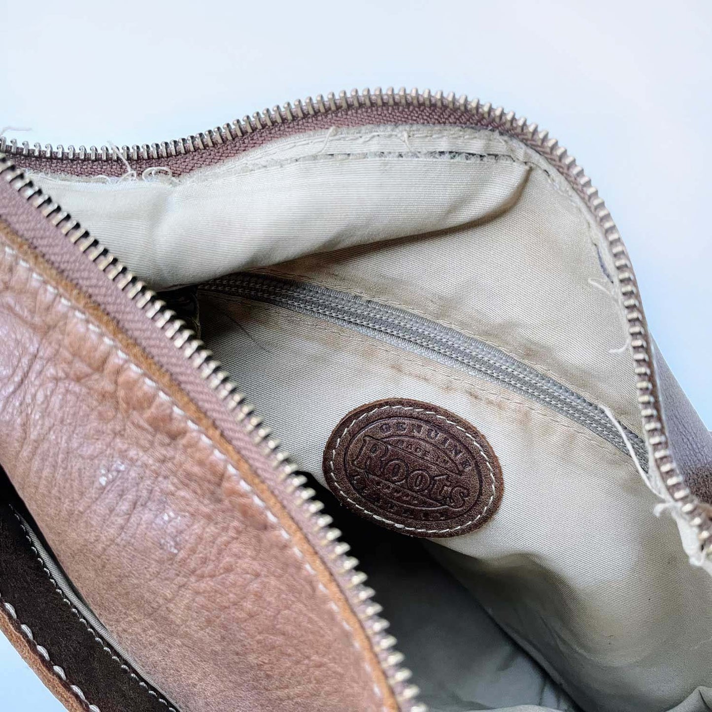 roots ventian village tribe leather bag