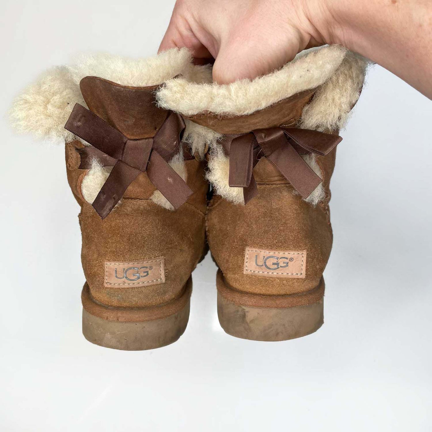 ugg natural mini bailey bow sheepskin boots - size 9
