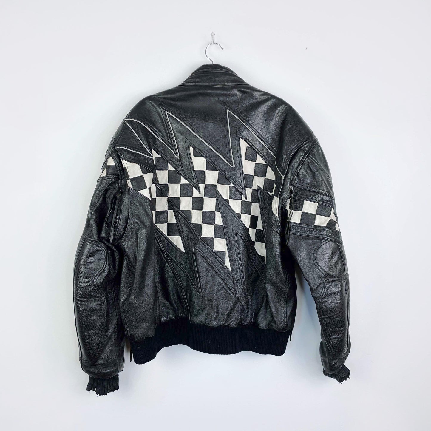 vintage 80s coldwave checkerboard bolt moto jacket