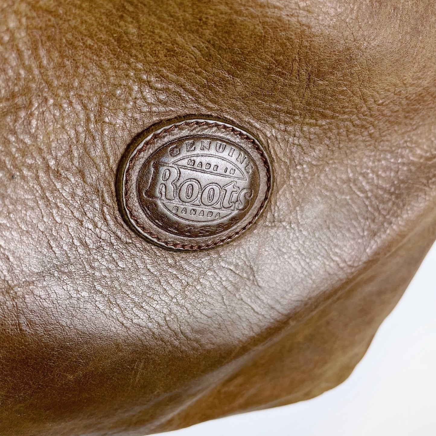 vintage roots pebbled leather villager bag