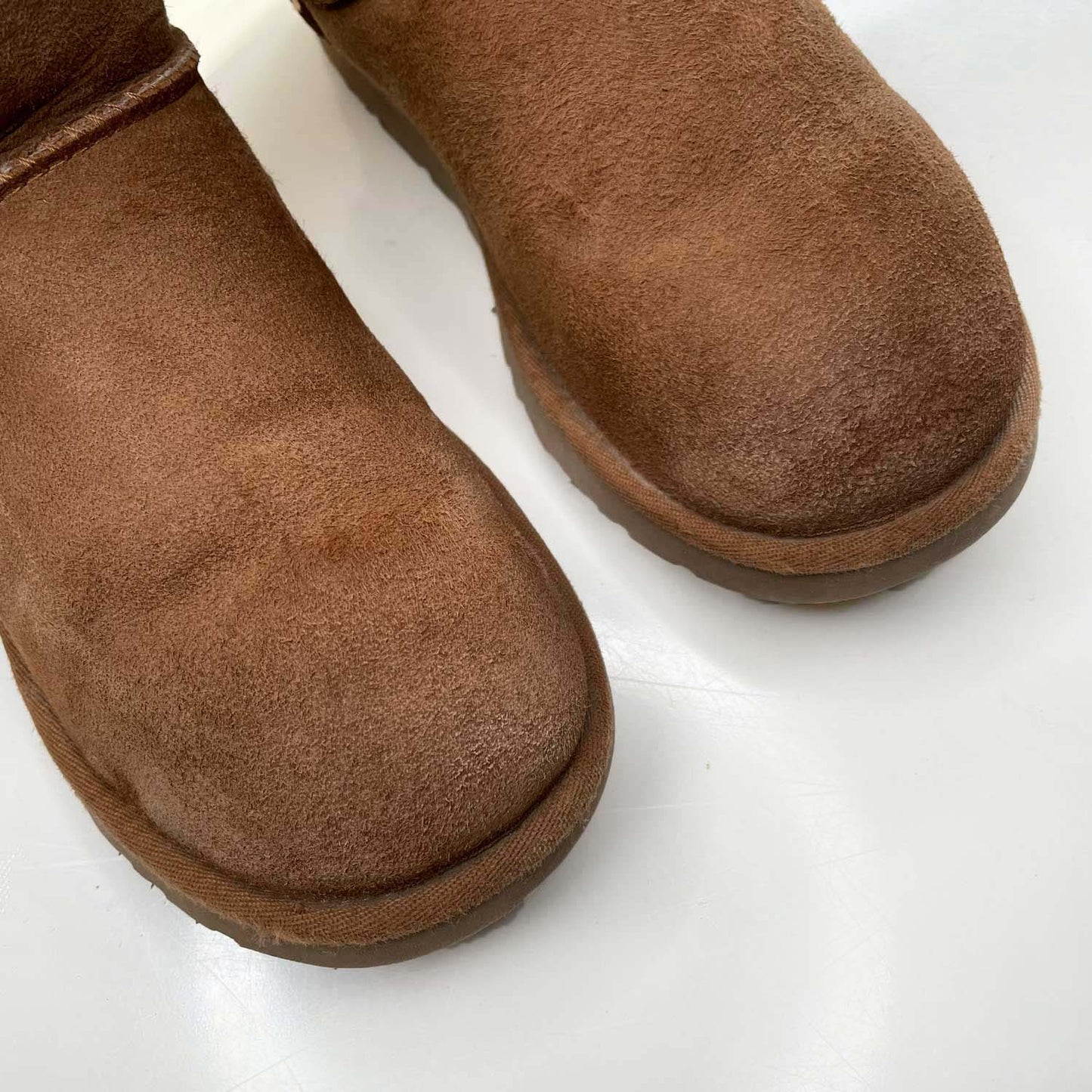 ugg natural mini bailey bow sheepskin boots - size 7