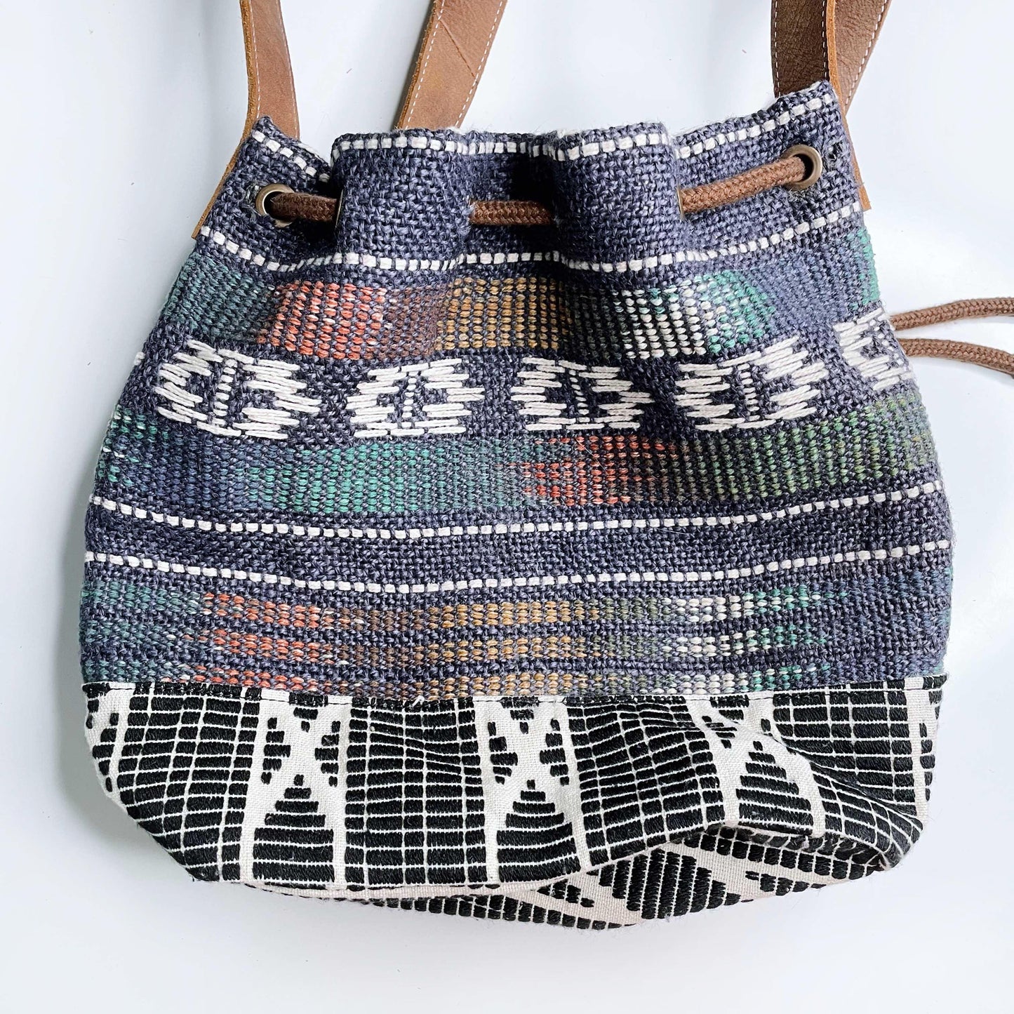 roots woven jute bucket bag with leather trim