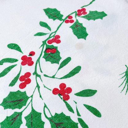 vintage candles and holly holiday table cloth
