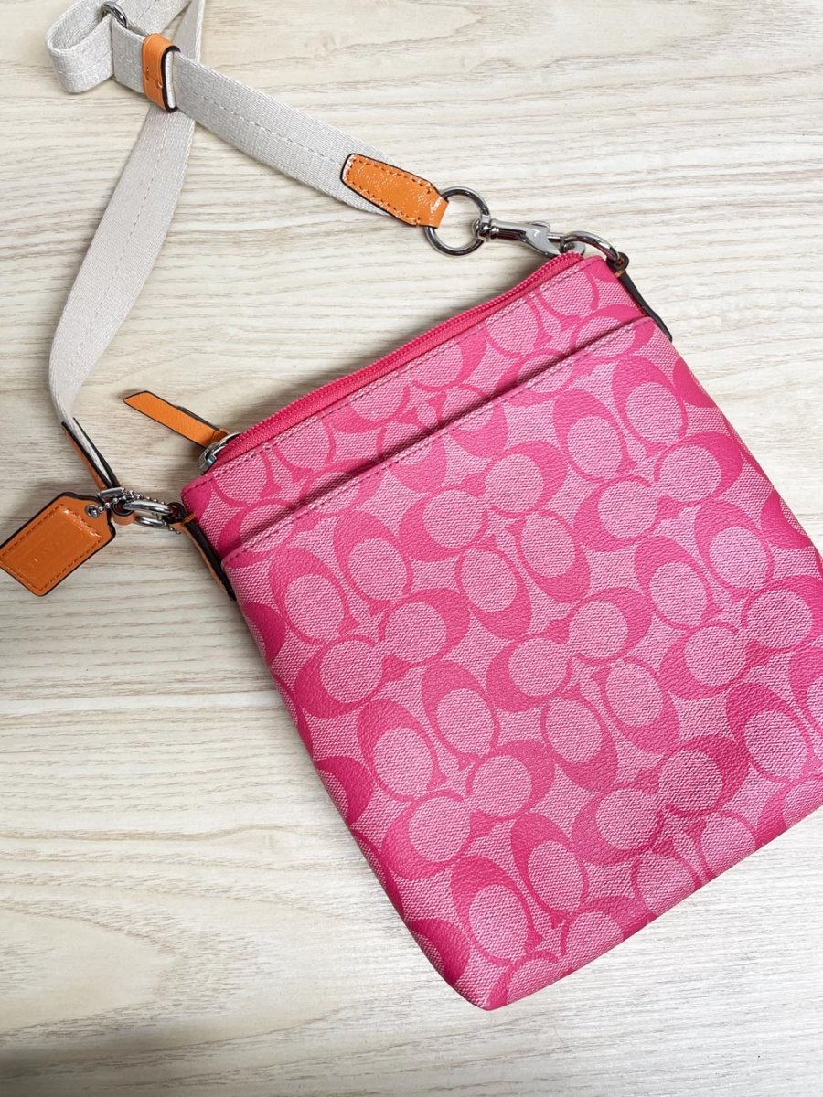 coach monogram canvas swingpack - good market thrift store