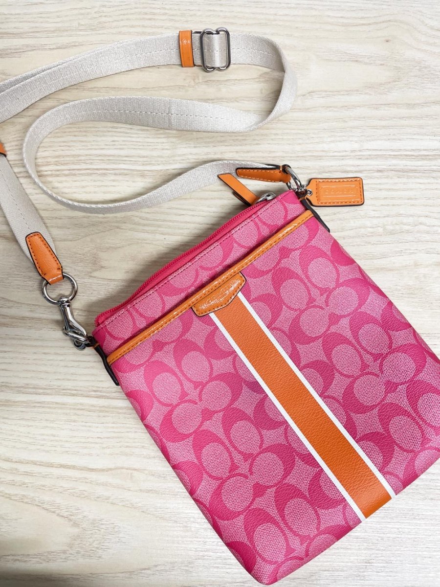 coach monogram canvas swingpack - good market thrift store