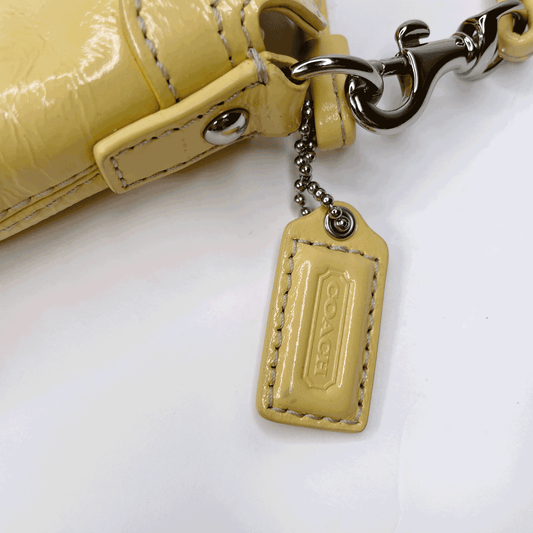 coach yellow patent leather wristlet