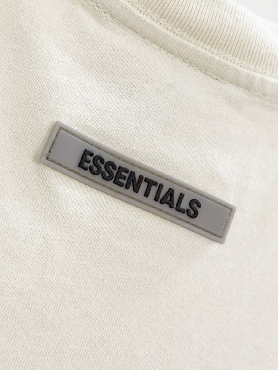 fear of god essentials basic spellout tee - good market thrift store