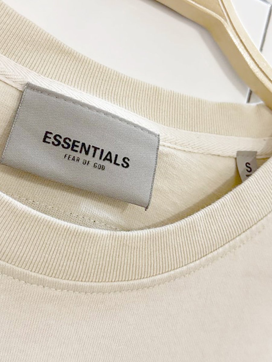 fear of god essentials basic spellout tee - good market thrift store