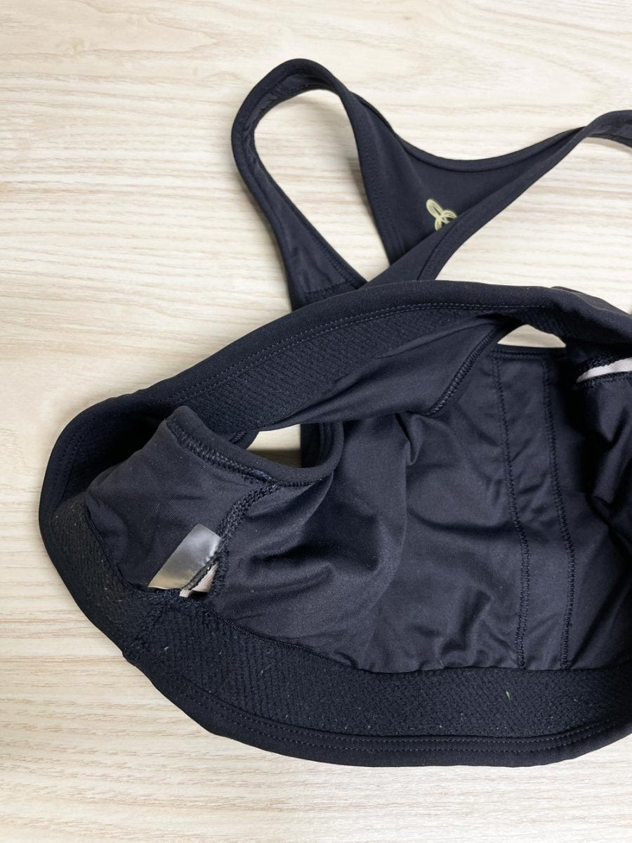 golden by tna sports bra | aritzia - good market thrift store