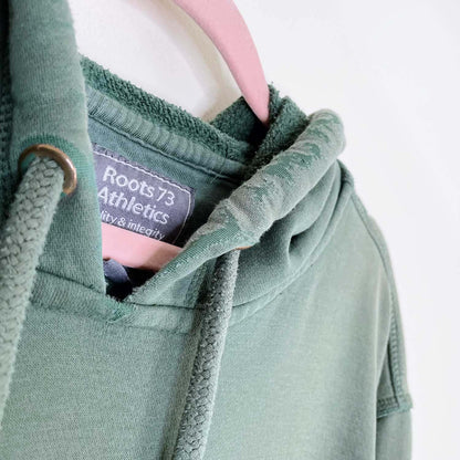 vintage roots green hooded sweatshirt - size large
