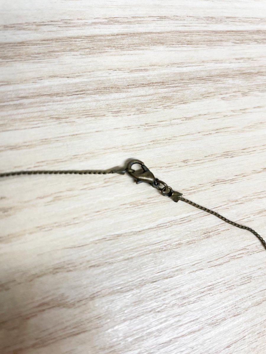 handmade metal triangle necklace - good market thrift store