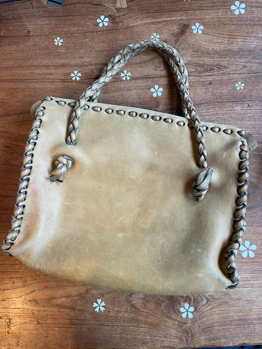 vintage leather tote with braided trim and handle