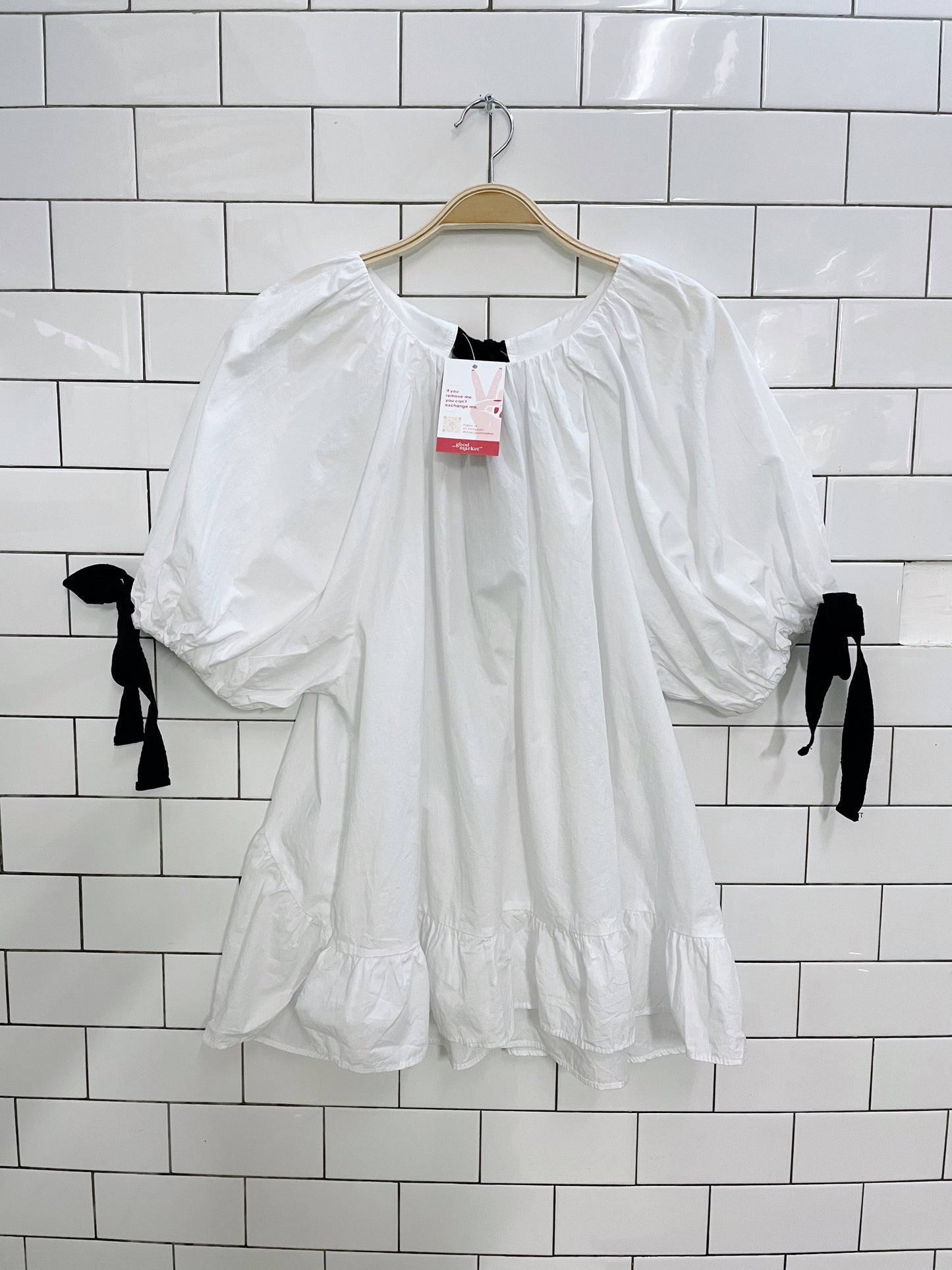 white puff sleeve peplum hem tie blouse