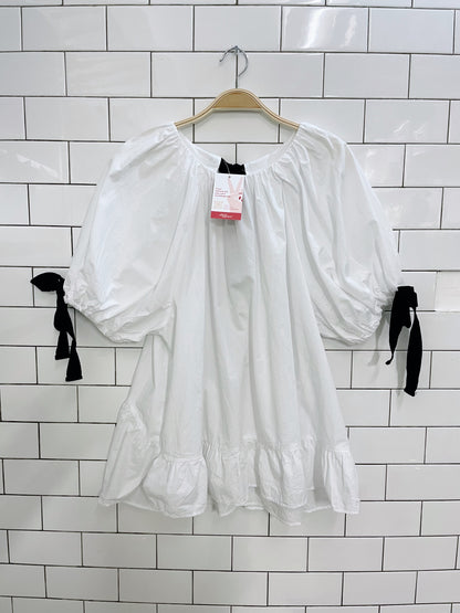 white puff sleeve peplum hem tie blouse