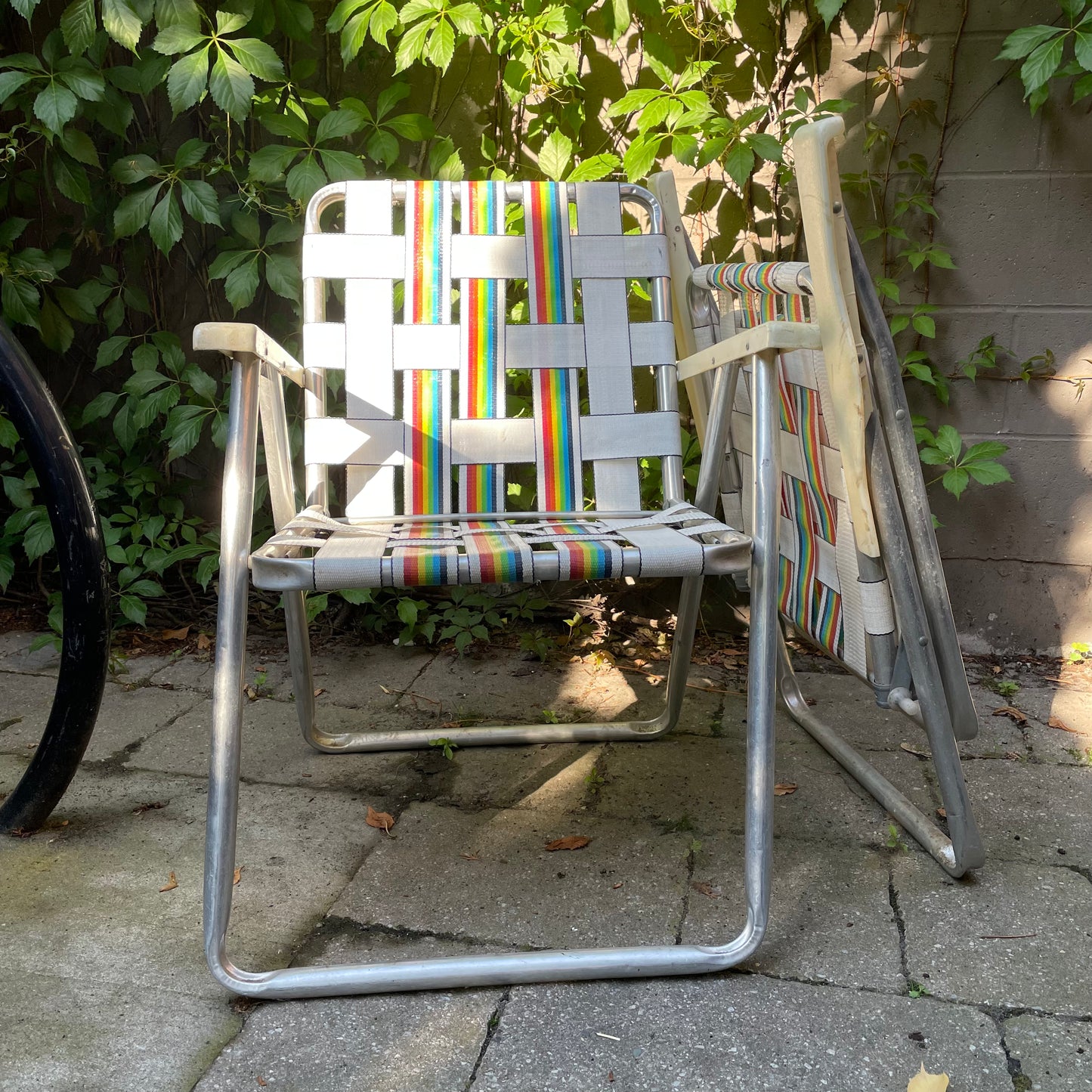 set of 2 vintage pride rainbow woven lawn chairs