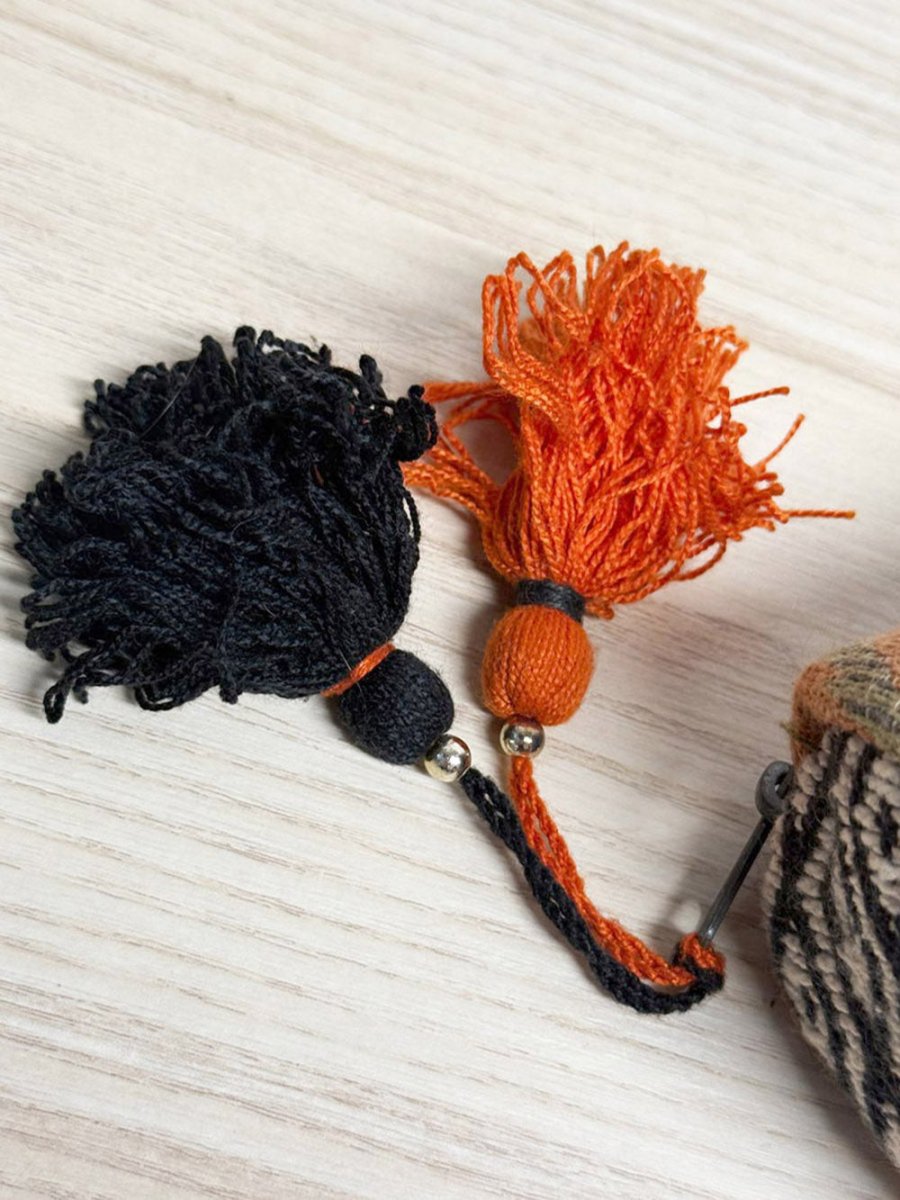 "it matters!" studio aztec woven tassel zip case - good market thrift store