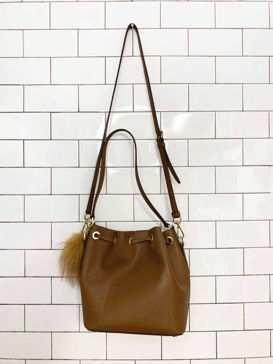 michael kors faux leather pom charm bucket bag - good market thrift store