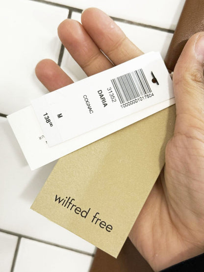 nwt wilfred free daria faux leather leggings | aritzia - good market thrift store