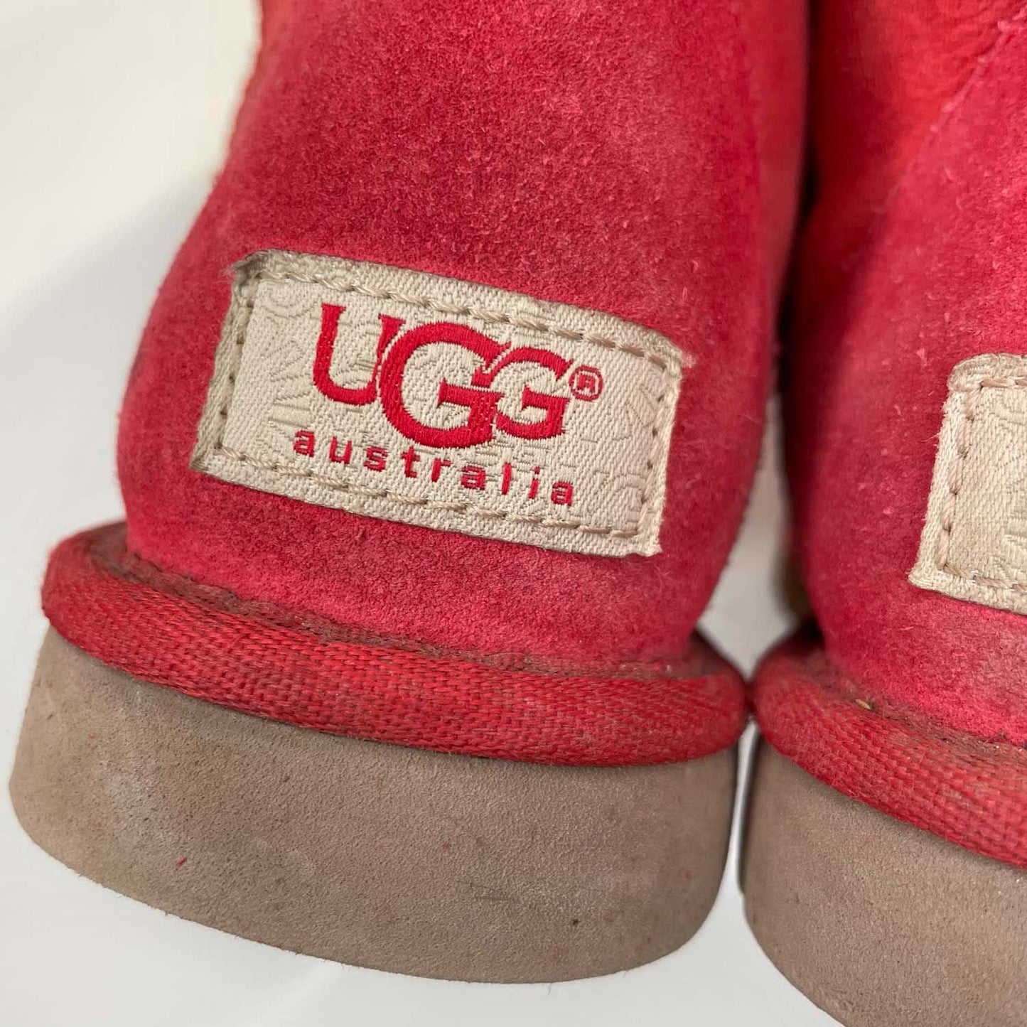 ugg classic short sheepskin boots in ribbon red - size 5