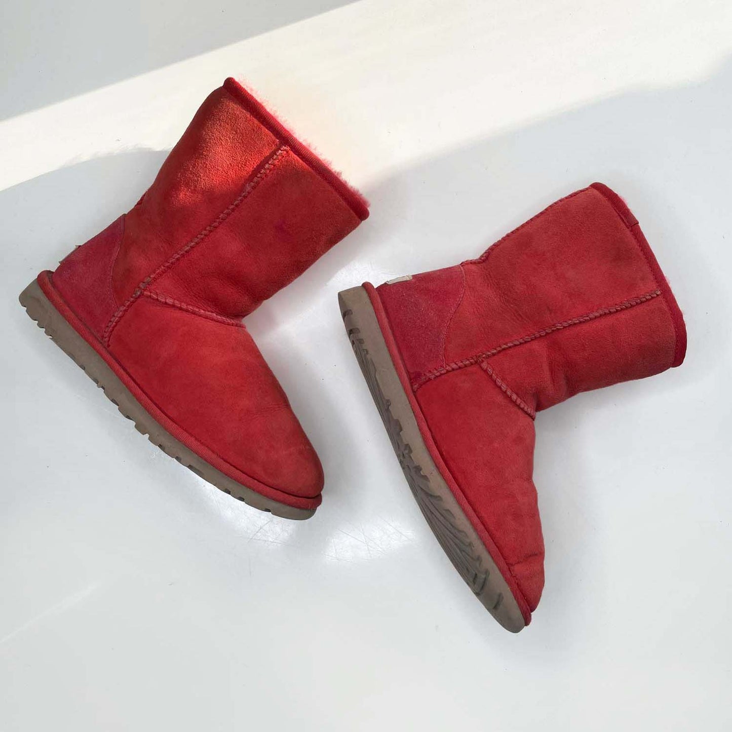 ugg classic short sheepskin boots in ribbon red - size 5