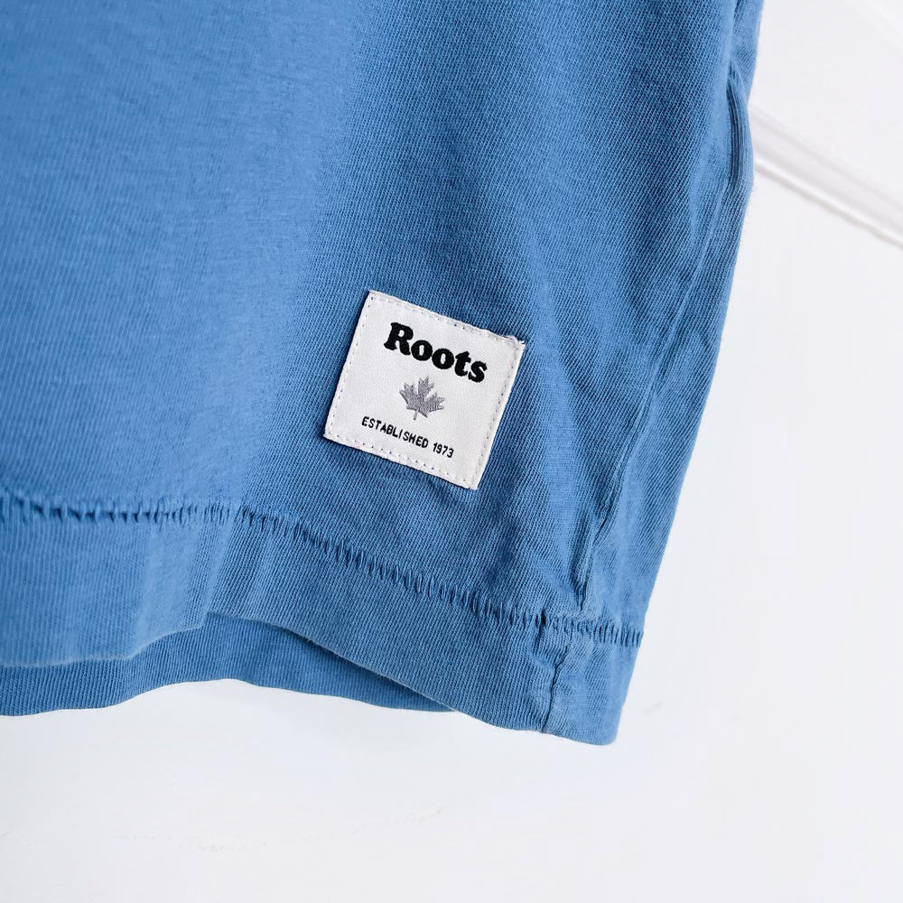 roots x earth activist pocket tee