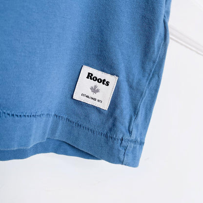 roots x earth activist pocket tee