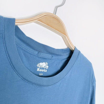 roots x earth activist pocket tee