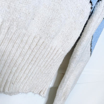 american eagle snoopy sledding knit sweater