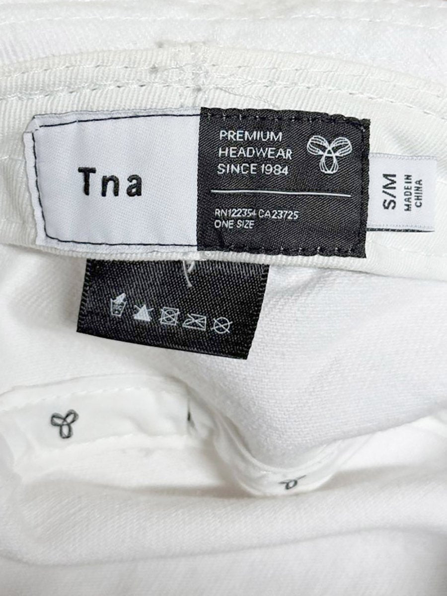 tna embroidered logo bucket hat | aritzia - good market thrift store