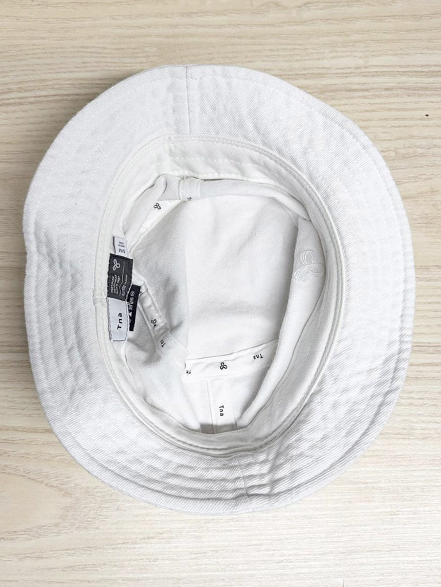 tna embroidered logo bucket hat | aritzia - good market thrift store