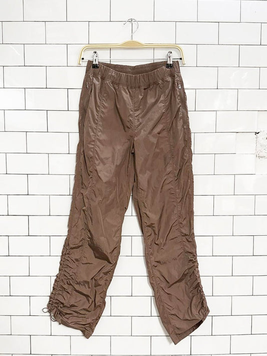 tnaAction nylon cinch ankle prima pant | aritzia - good market thrift store