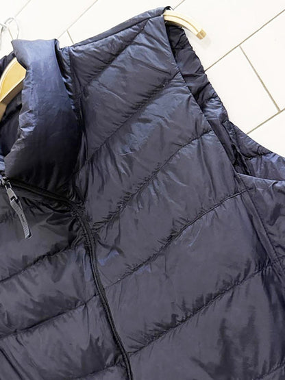 uniqlo ultra light down puffer vest | drawstring hem - good market thrift store
