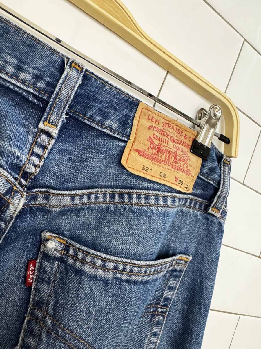 vintage 00s levi's 521 straight raw hem jeans - good market thrift store