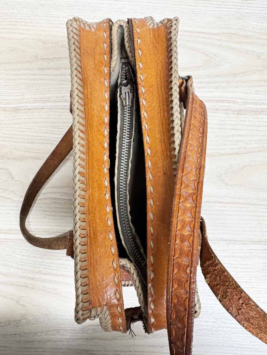 vintage 70s tooled leather braided edge structured handbag | lightning zipper - good market thrift store