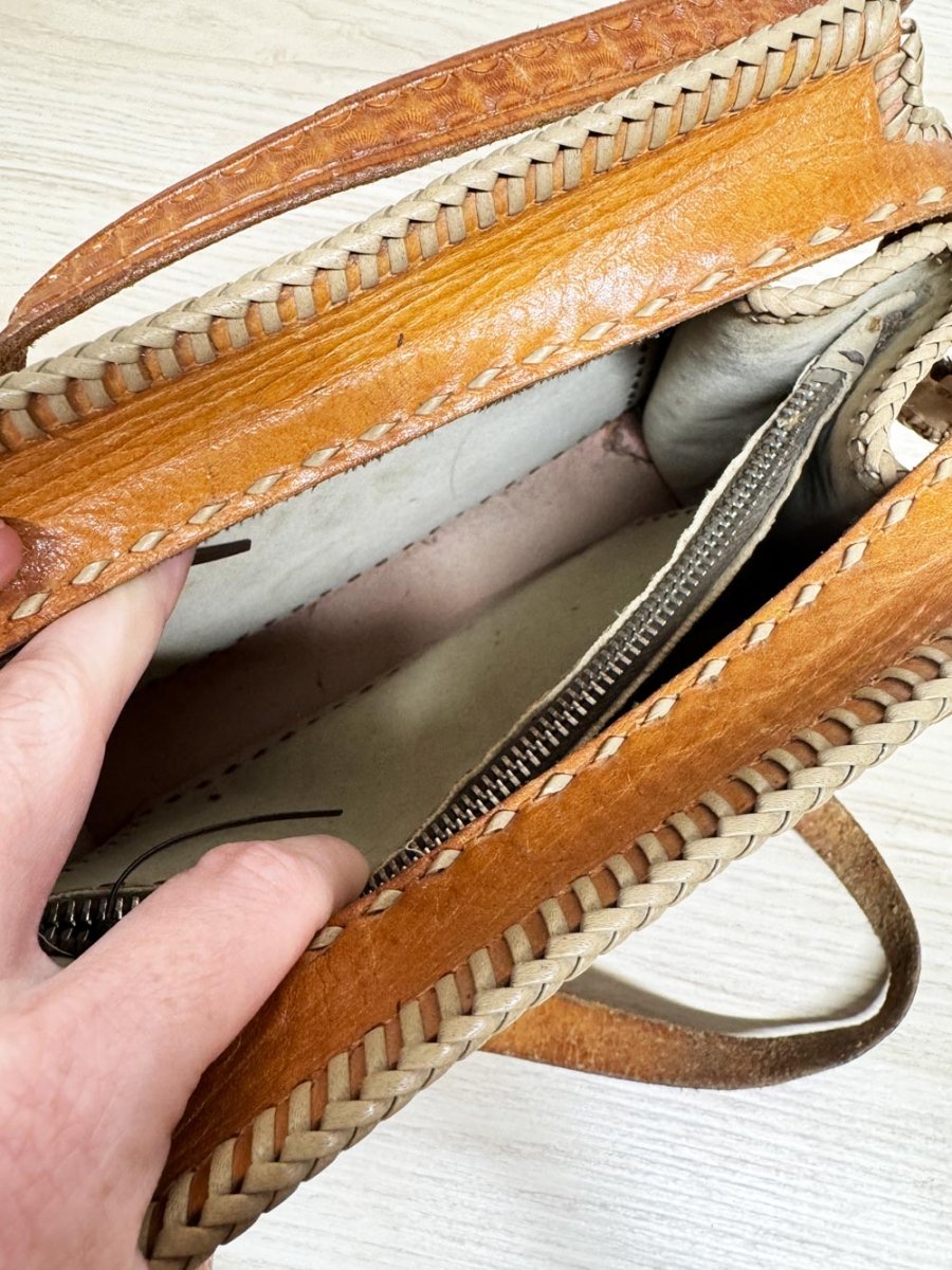 vintage 70s tooled leather braided edge structured handbag | lightning zipper - good market thrift store