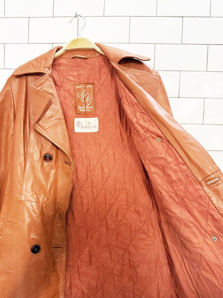 vintage AQG leather double breasted belted trench coat | made in Spain | the mulberry bush - good market thrift store