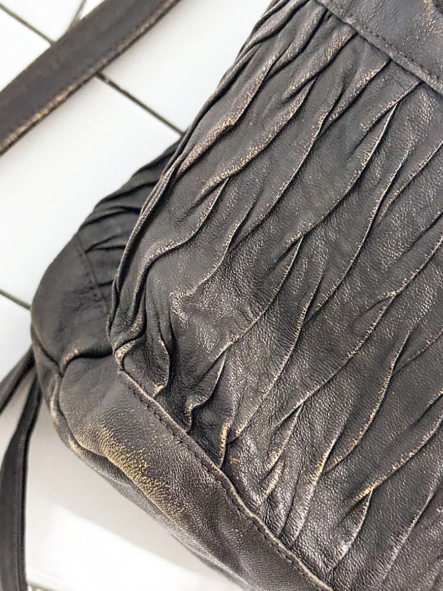 vintage textured drawstring leather backpack - good market thrift store